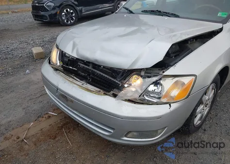 2001 Toyota Avalon Xls z USA, uszkodzony, nr VIN 4T1BF28B81U121468